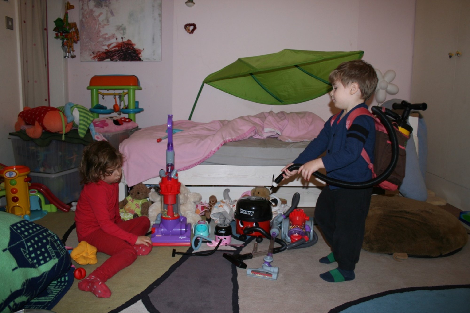 Marlon and Ava with their hoover collection